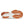 Close-up of a shoe sole with orange tread pattern on a white background