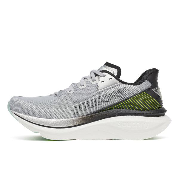 Gray running shoe with a white sole on a white background