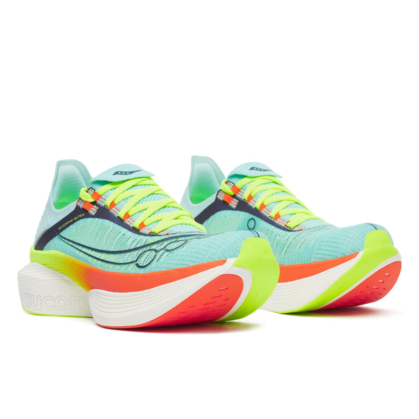 A pair of carbon plated Saucony running shoes.