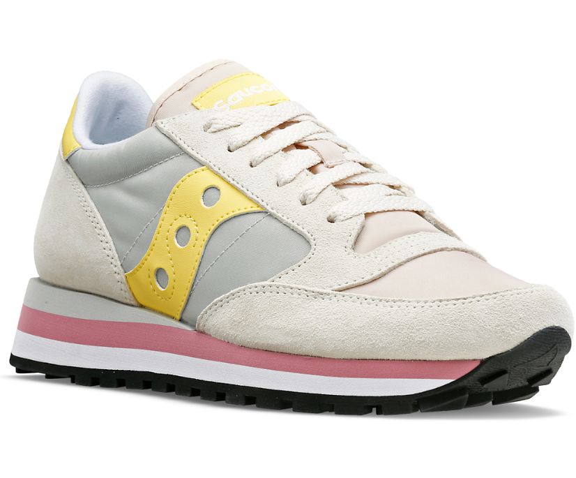 Front angle view of the Women's Jazz Triple by Saucony in the color Gray/Yellow