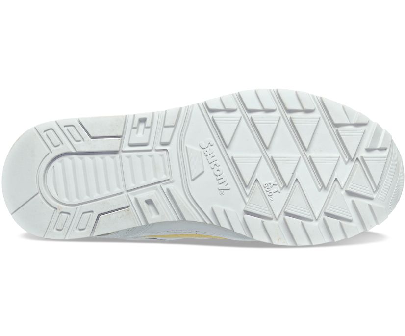 Bottom (outer sole) view of the Women's Shadow 6000 by Saucony in the color White/Yellow/Pink