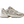 A New Balance athletic sneaker in beige, white, and brown, shown against a plain white background.