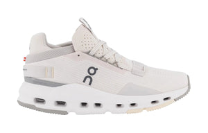 Gray athletic shoe with 'On' branding on a white background.