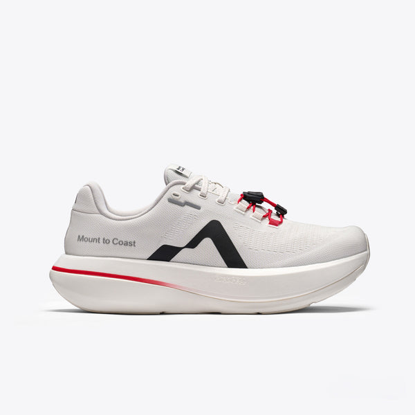 White running shoe with red and black accents on a white background