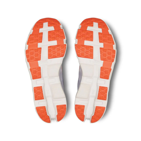 The outsole of this Women's Cloudmonster hyper is mostly orange.