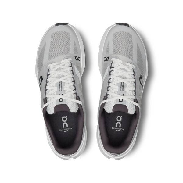 A pair of women's on Cloudsurfer Next with white laces and a grey upper.