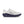 White running shoe with navy sole on a white background