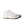 White sneaker with black sole on a white background