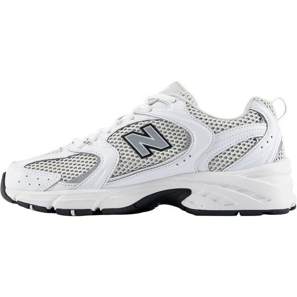 White athletic shoe with gray accents on a white background