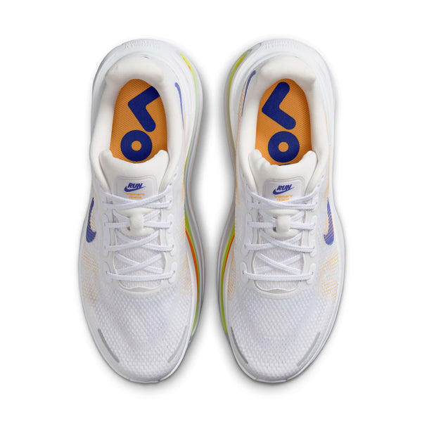 Pair of white running shoes with colorful accents on a white background