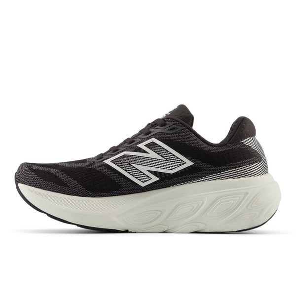 The medial side of tis women's running shoe has a white and black N logo for New Balance.