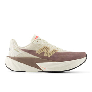 White and brown running shoe with New Balance logo on a white background.