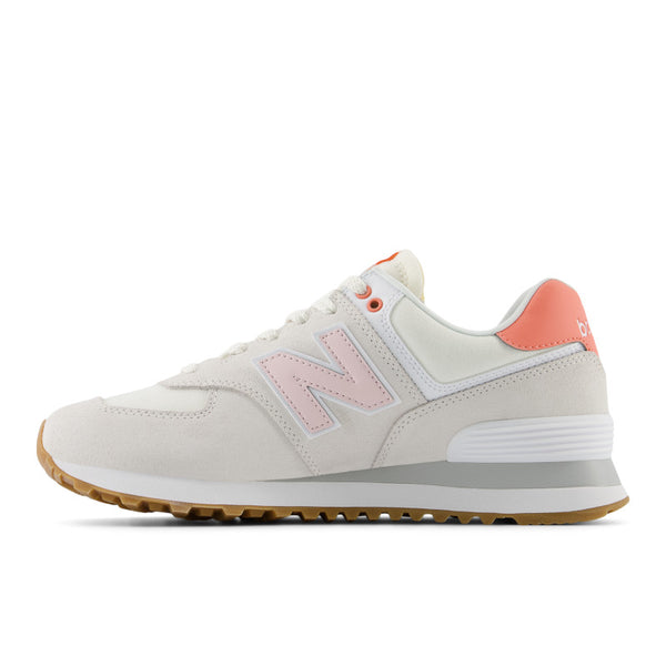 The medial side of the Women's 574 have a large monochromatic N for new Balance.