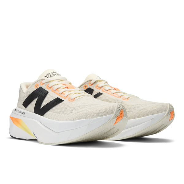 A pair of NB training shoes with a light colored upper.