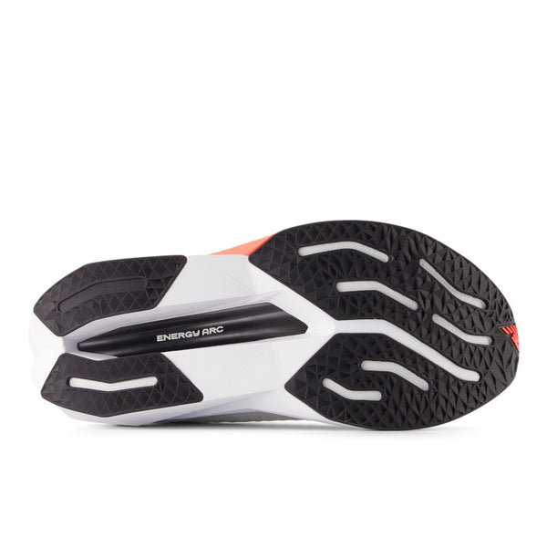 Close-up of a running shoe sole with 'Energy Arc' text on a white background.
