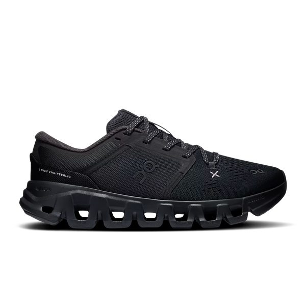 A black On running shoe with a chunky, hollowed-out sole, shown in a side profile view against a white background.