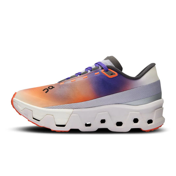Multicolored running shoe on a white background