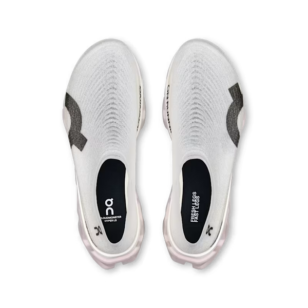 A pair of white and gray spreayed on upper athletic shoes shown from a top-down view on a white background.