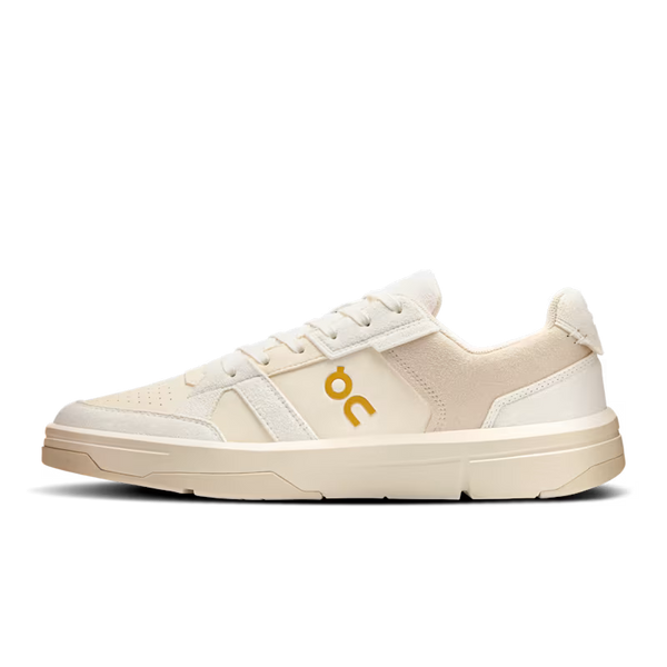 The medial side of a lifestyle with an On logo.