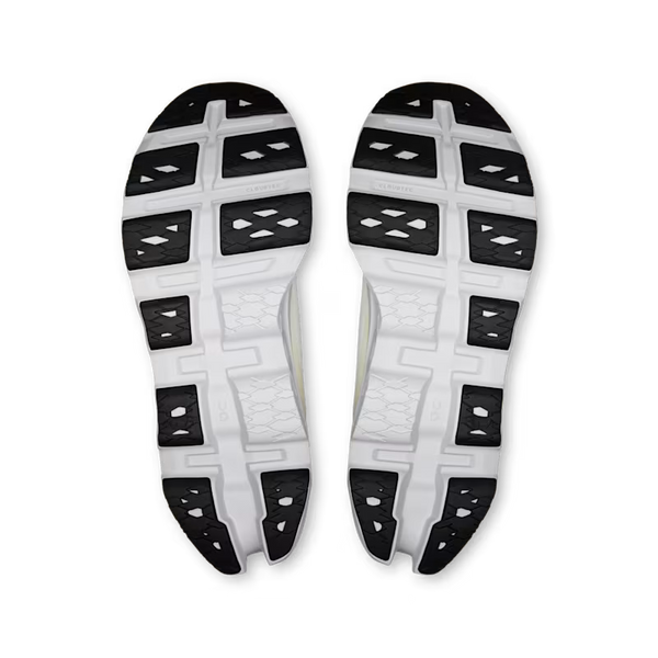 A pair of athletic shoes shown from the sole view, featuring a white and black treaded outsole on a plain white background.