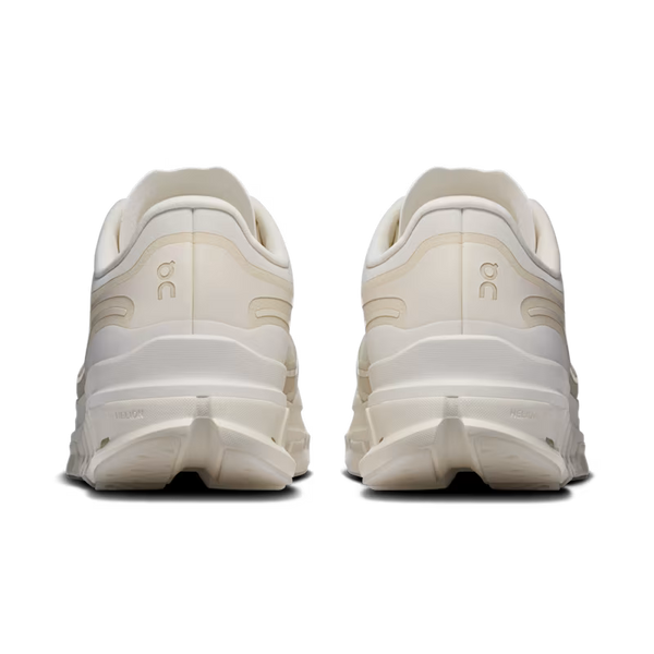 A pair of off-white chunky sneakers shown from the rear, featuring a thick layered sole and the 'on' logo on the heel, set against a plain white background.