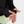 Thumbholes on half zip on a plain background
