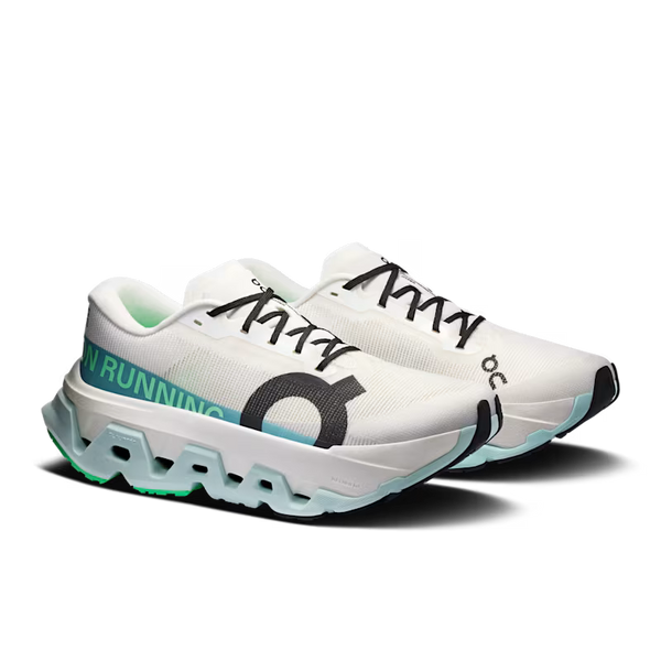 A pair of Women's On running shoes with black shoe laces and a mostly white upper.