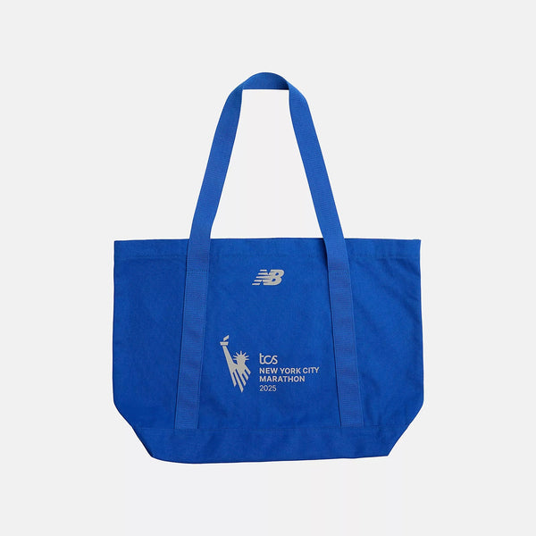 Blue tote bag with New Balance logo and text on a white background