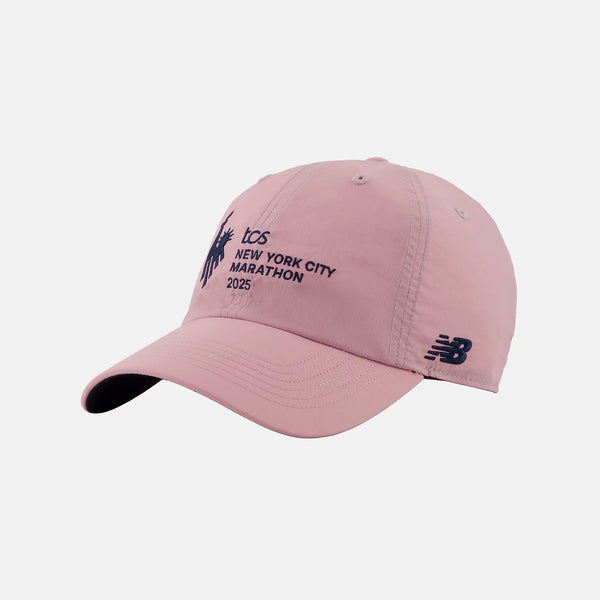Pink cap with 'TCS New York City Marathon 2023' text on a white background