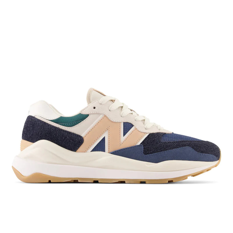 Lateral view of the Men's New Balance 5740 Lifestyle shoe in the color Blue/Black/Peach