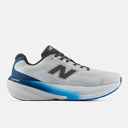 A New Balance running shoe in white, gray, and blue against a light gray background.