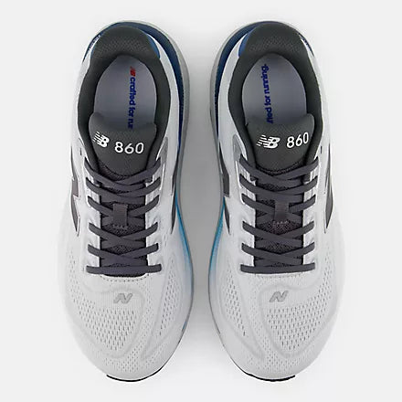 A New Balance running shoe in white, gray, and blue against a light gray background.