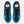 A New Balance running shoe in bright blue, black, and gray, shown against a light gray background.