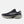 Navy running shoe with white sole on a light gray background