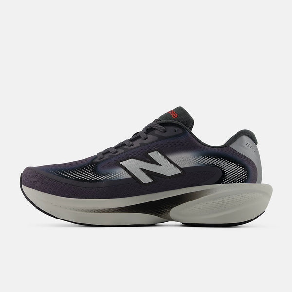 Navy running shoe with white sole on a light gray background
