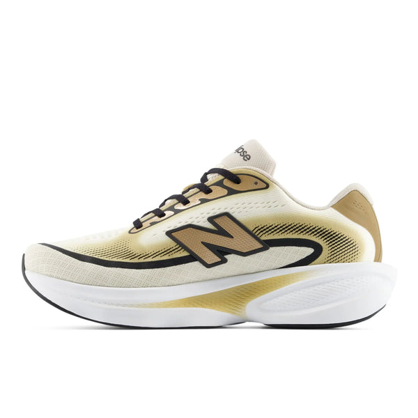 A New Balance running shoe in off-white, gold, and black, shown from a side profile view against a plain white background.