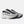 A New Balance running shoe in white, black, and gray, shown against a plain white background.