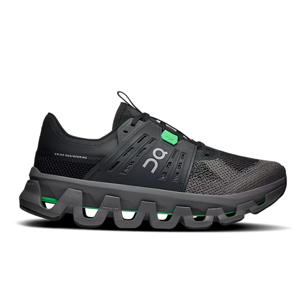 A black On Lifestyle and fashion shoe with a chunky, wavy gray sole and bright green accents on the laces and midsole, shown from a side profile on a white background.