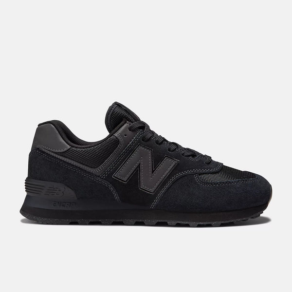 All black New Balance sneaker on a light gray background