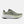 Dark green New balance running shoe with white sole on a light gray background