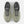 Pair of green running shoes with 'FRE' and 'more' text on a white background