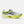 A New Balance running shoe in neon yellow, light gray, and black, shown from a side profile view against a light gray background.
