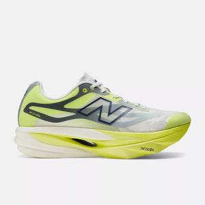 A New Balance running shoe in neon yellow, light gray, and black, shown from a side profile view against a light gray background.