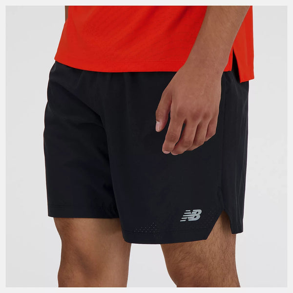Black athletic shorts with a brand logo on a white background