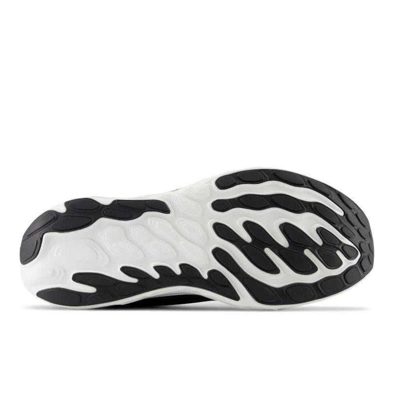The outsole of the Vongo V6 has black pods where there is carbon rubber for durability