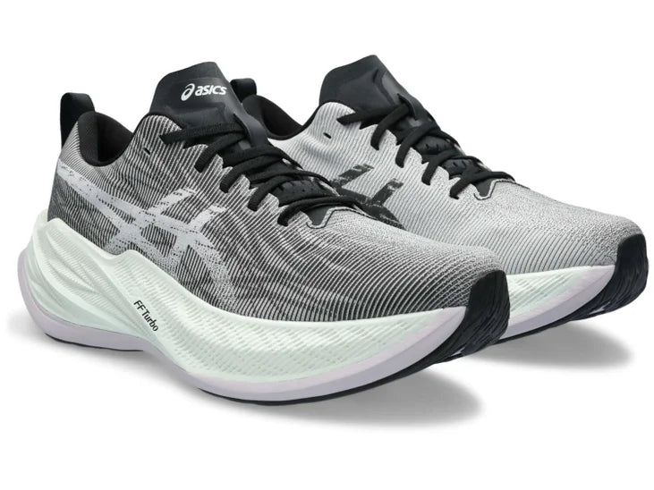 Front angled view of the Unisex SuperBlast by ASICS in the color White/Lilac Hint