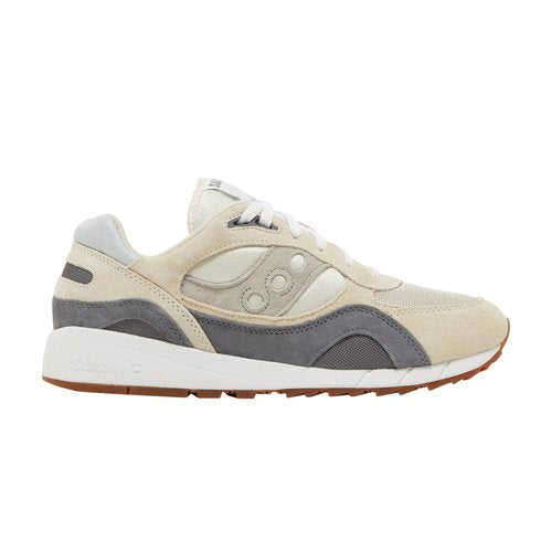 Beige and gray sneaker with white sole on a white background