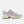 Gray sneaker with 'New Balance' branding on a white background