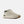 Beige sneaker with brown sole on a white background
