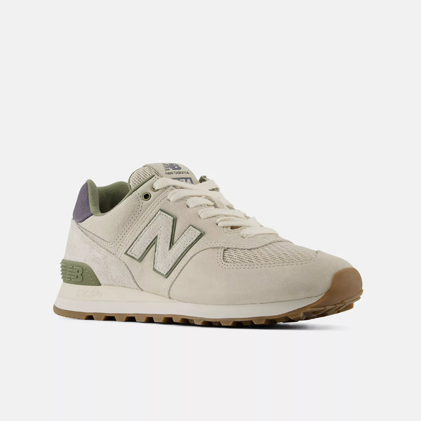 Beige sneaker with brown sole on a white background